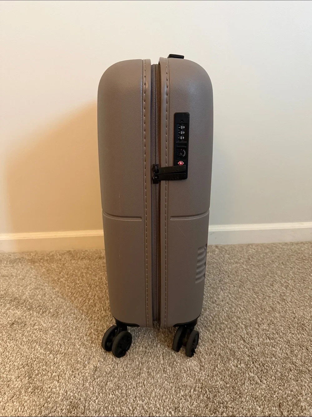 Compact Beige Rolling Storage Case with Smooth Wheels